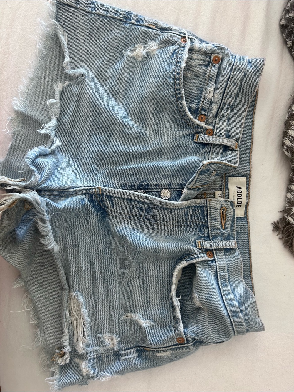 AGOLDE Light Wash Distressed Denim Cutoff Shorts